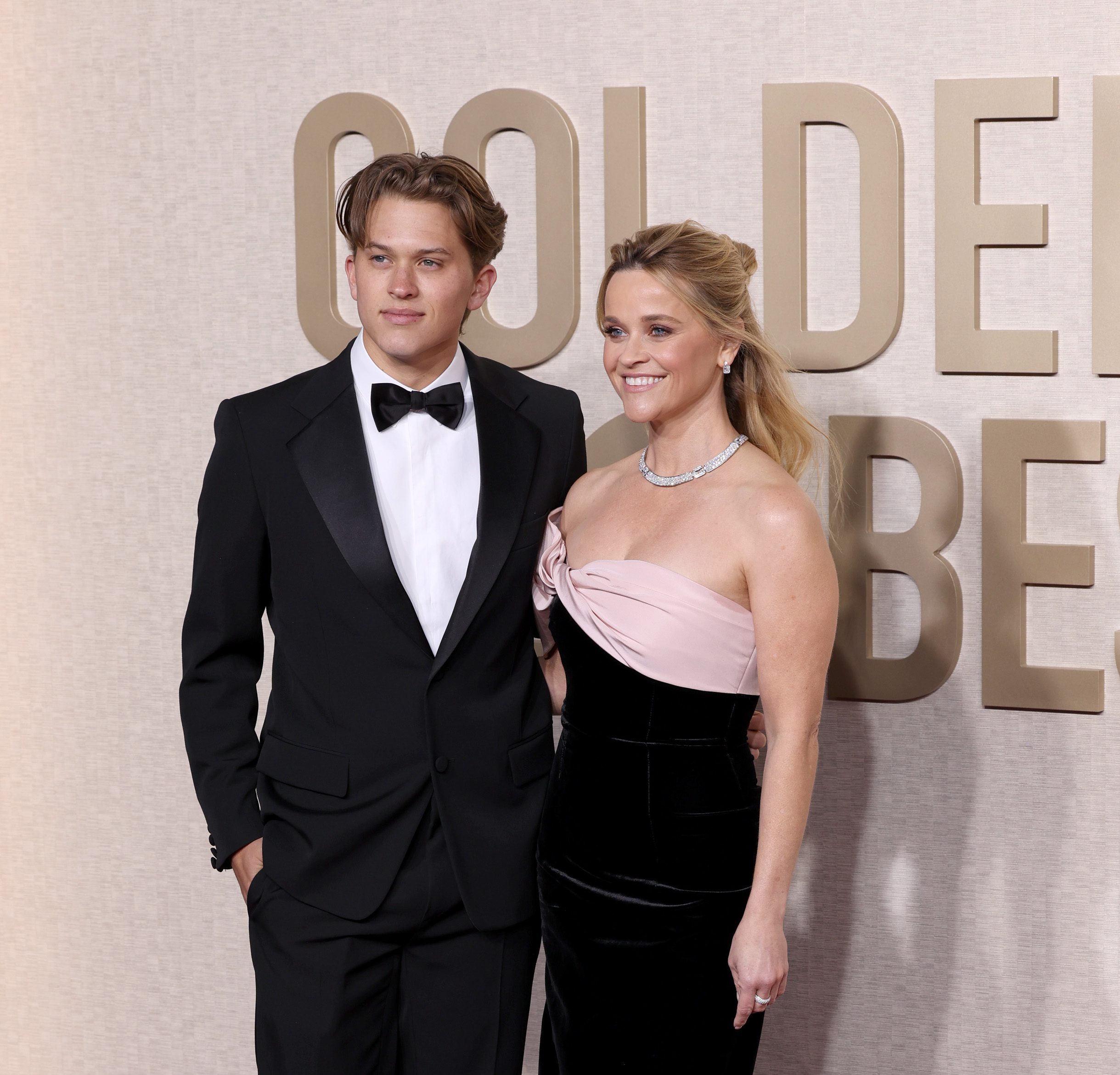 BEVERLY HILLS, CALIFORNIA - JANUARY 07: (L-R) Deacon Phillippe and Reese Witherspoon attend the 81st Annual Golden Globe Awards at The Beverly Hilton on January 07, 2024 in Beverly Hills, California. 