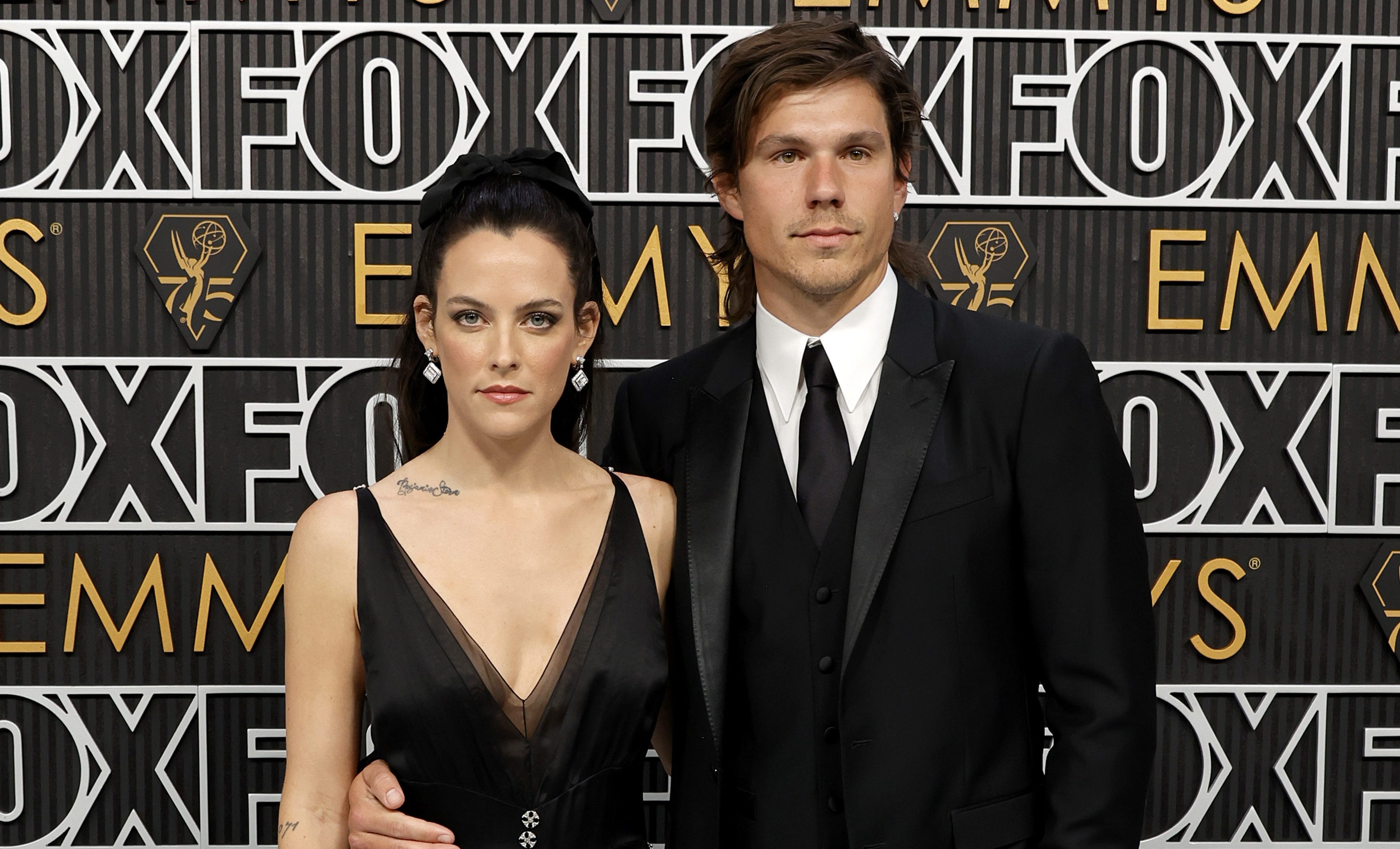 LOS ANGELES, CALIFORNIA - JANUARY 15: (L-R) Riley Keough and Ben Smith-Petersen attend the 75th Primetime Emmy Awards at Peacock Theater on January 15, 2024 in Los Angeles, California. 