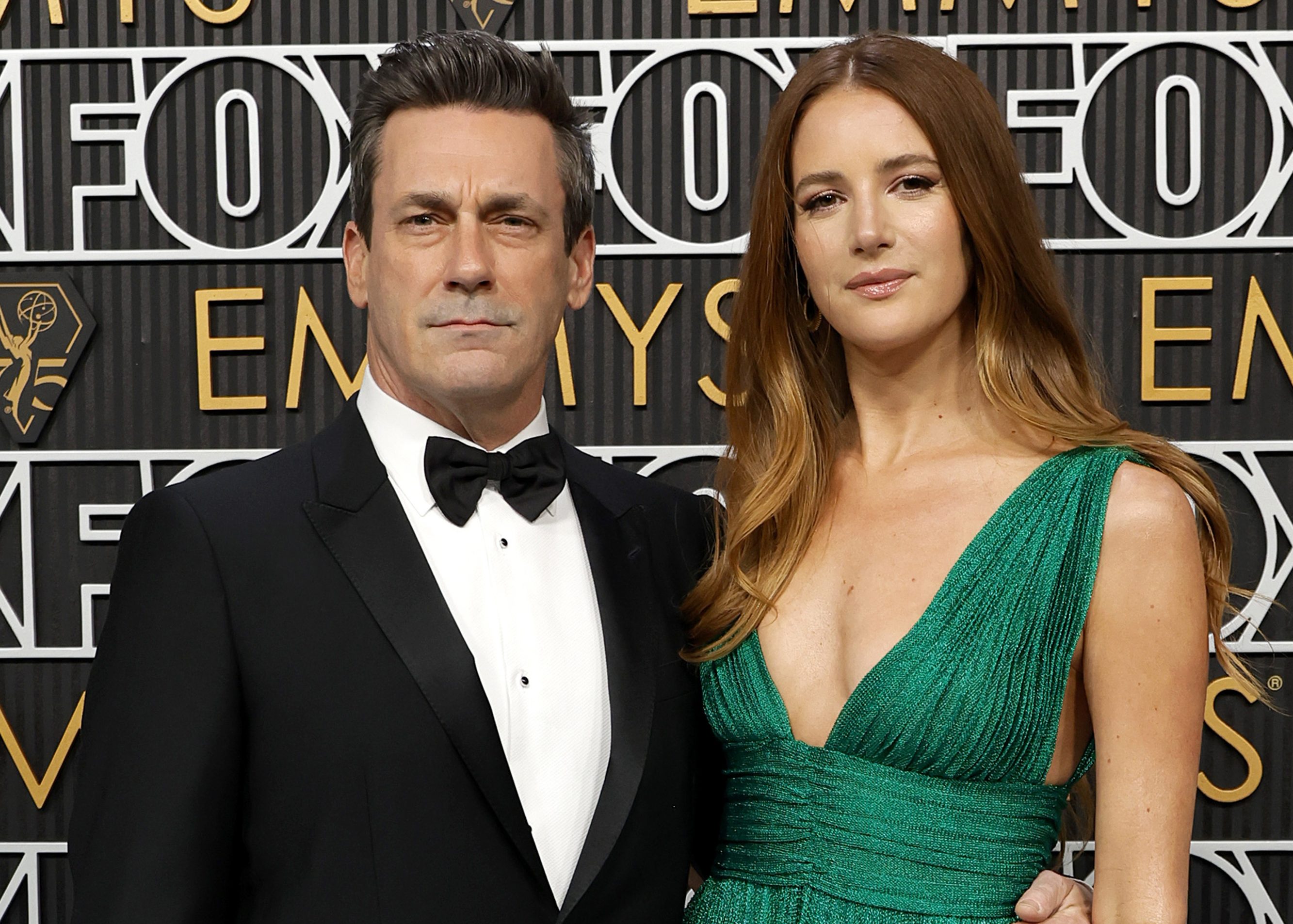 LOS ANGELES, CALIFORNIA - JANUARY 15: (L-R) Jon Hamm and Anna Osceola attend the 75th Primetime Emmy Awards at Peacock Theater on January 15, 2024 in Los Angeles, California.