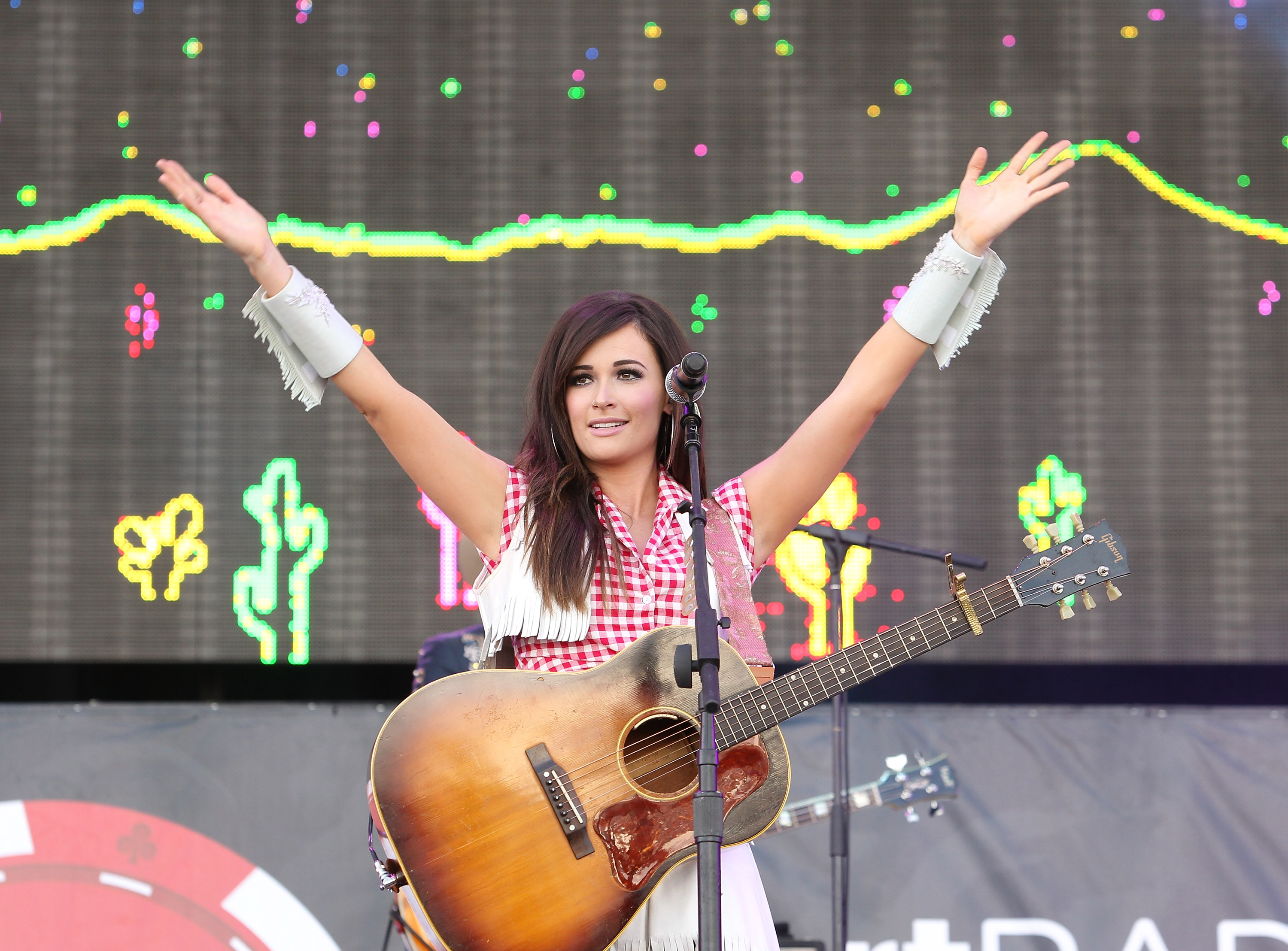 LAS VEGAS, NV - SEPTEMBER 20: Kacey Musgraves performs onstage during the 2014 iHeart Radio Music Festival Village held at The Lot at MGM Grand Resort and Casino on September 20, 2014 in Las Vegas, Nevada. 
