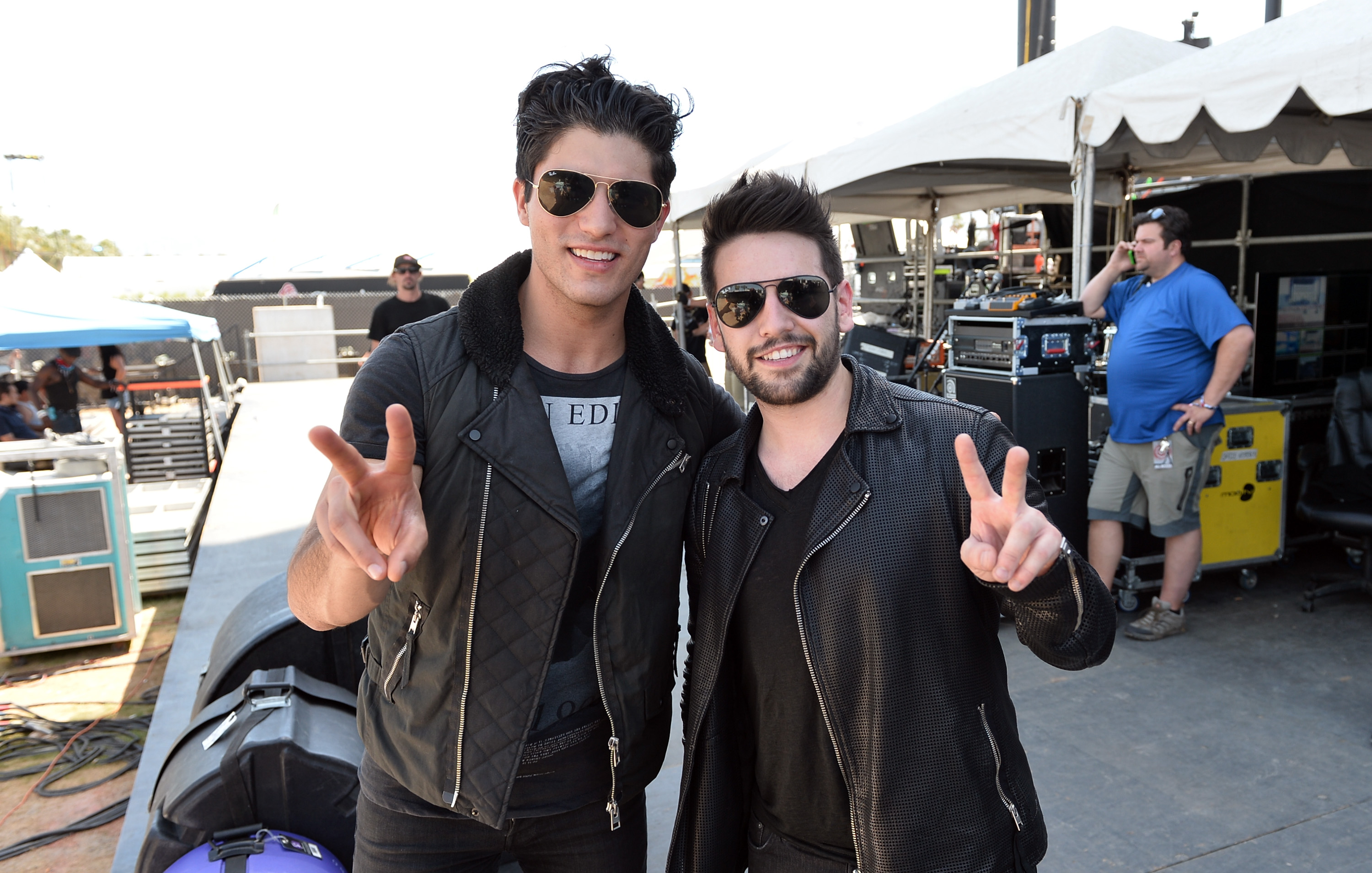 INDIO, CA - APRIL 26: Musicians Dan Smyers (L) and Shay Mooney of Dan + Shay pose backstage during day 2 of 2014 Stagecoach: California's Country Music Festival at the Empire Polo Club on April 26, 2014 in Indio, California. 