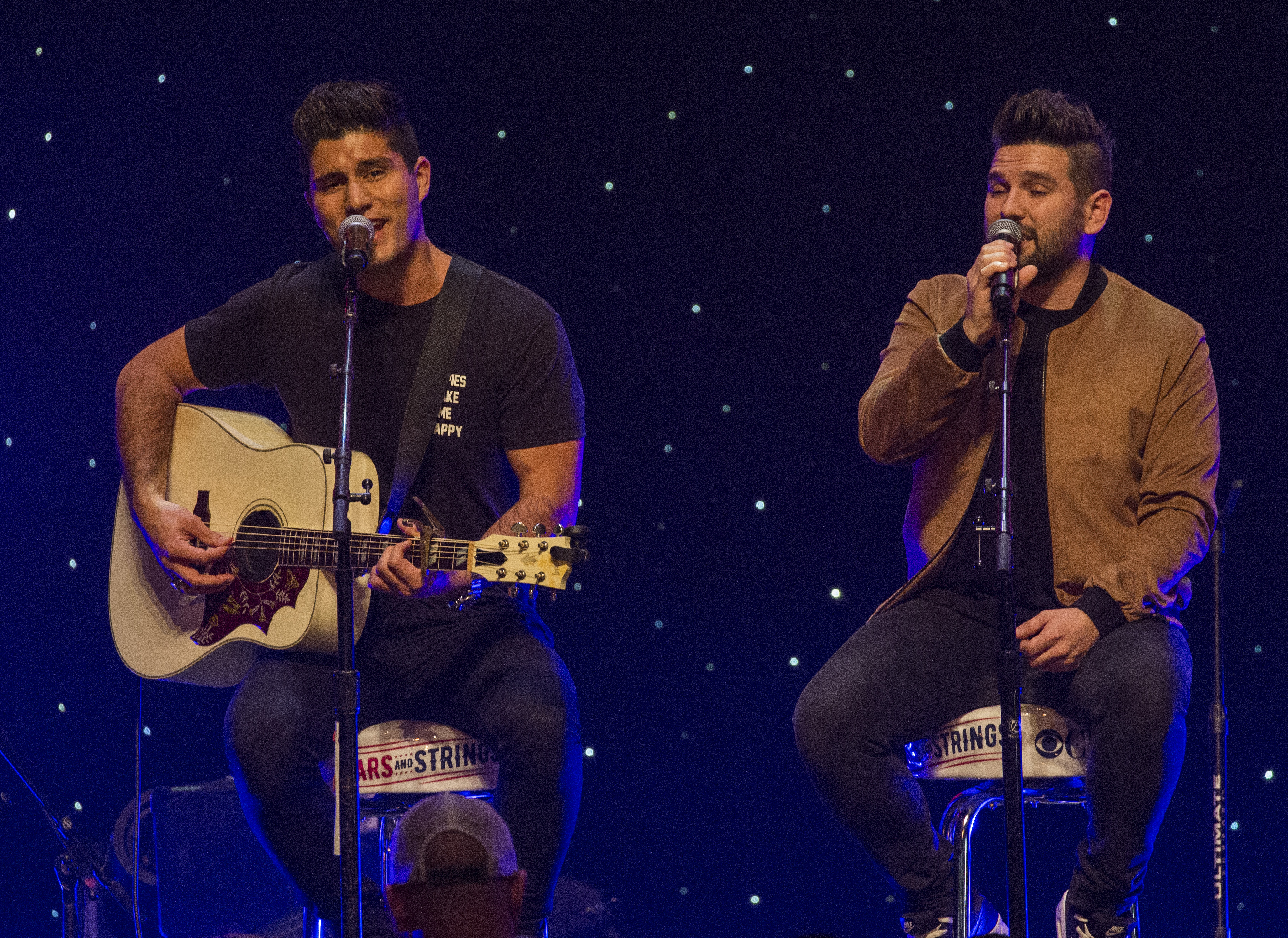 CHICAGO, ILLINOIS - NOVEMBER 09: Dan Smyers and Shay Mooney of Dan + Shay perform at CBS RADIOs second annual Stars and Strings concert at The Chicago Theatre on November 9, 2016 in Chicago, Illinois. 