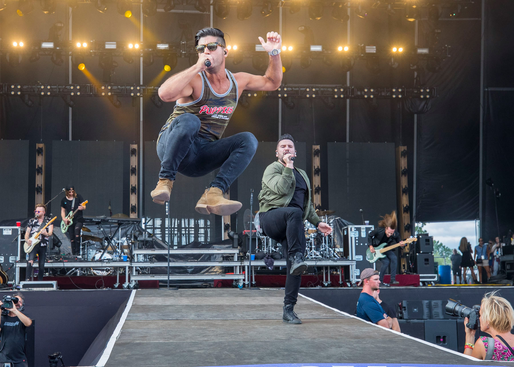BROOKLYN, MI - JULY 22: Dan Smyers (L) and Shay Mooney of Dan + Shay perform during day 2 of Faster Horses Festival at Michigan International Speedway on July 22, 2017 in Brooklyn, Michigan. 