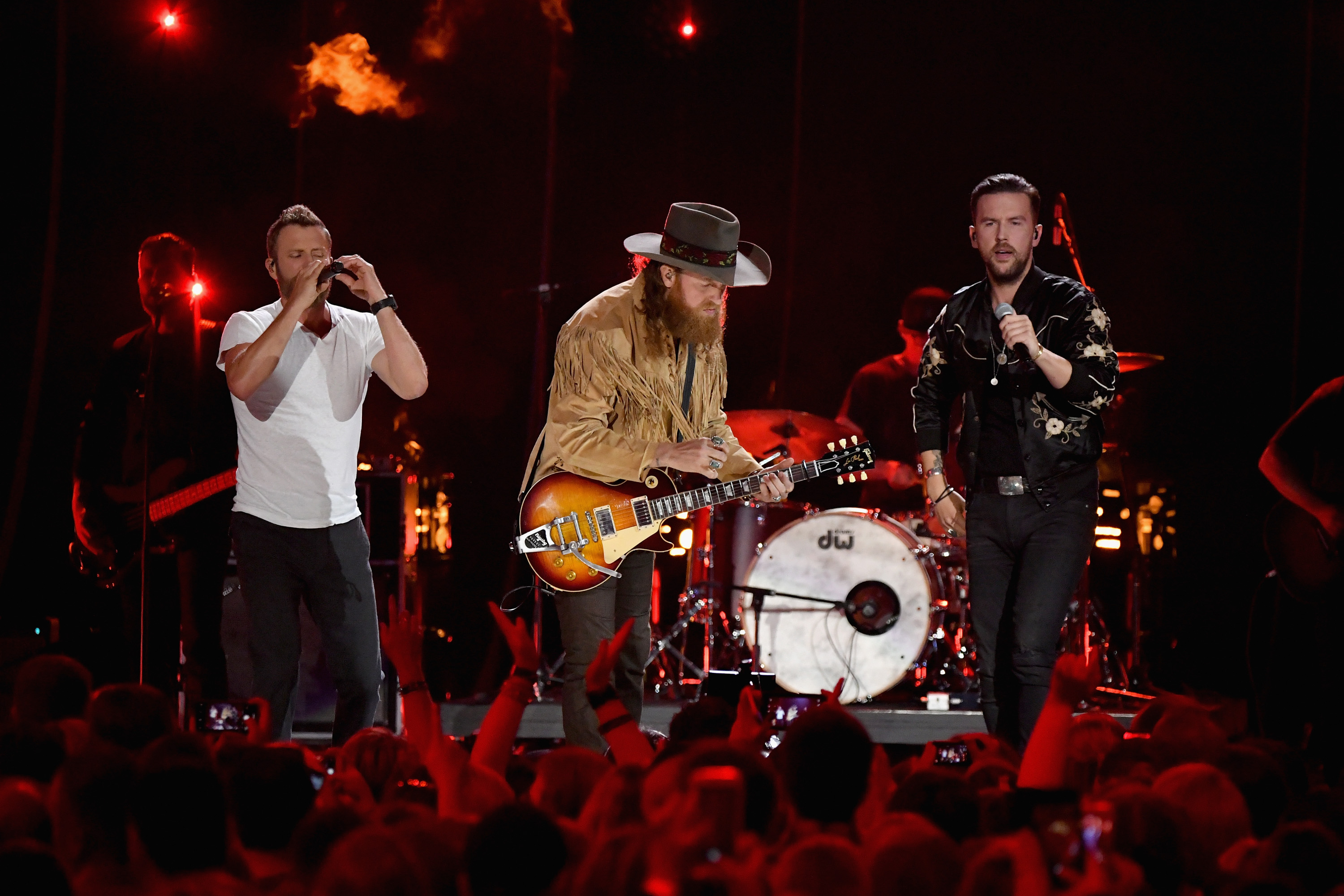 NASHVILLE, TN - JUNE 06: (L-R) Dierks Bentley, John Osborne and T.J. Osborne perform onstage at the 2018 CMT Music Awards at Bridgestone Arena on June 6, 2018 in Nashville, Tennessee. 