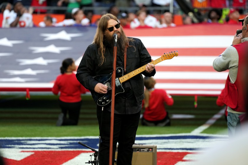 GLENDALE, ARIZONA - FEBRUARY 12: Chris Stapleton performs the national anthem during Super Bowl LVII at State Farm Stadium on February 12, 2023 in Glendale, Arizona.
