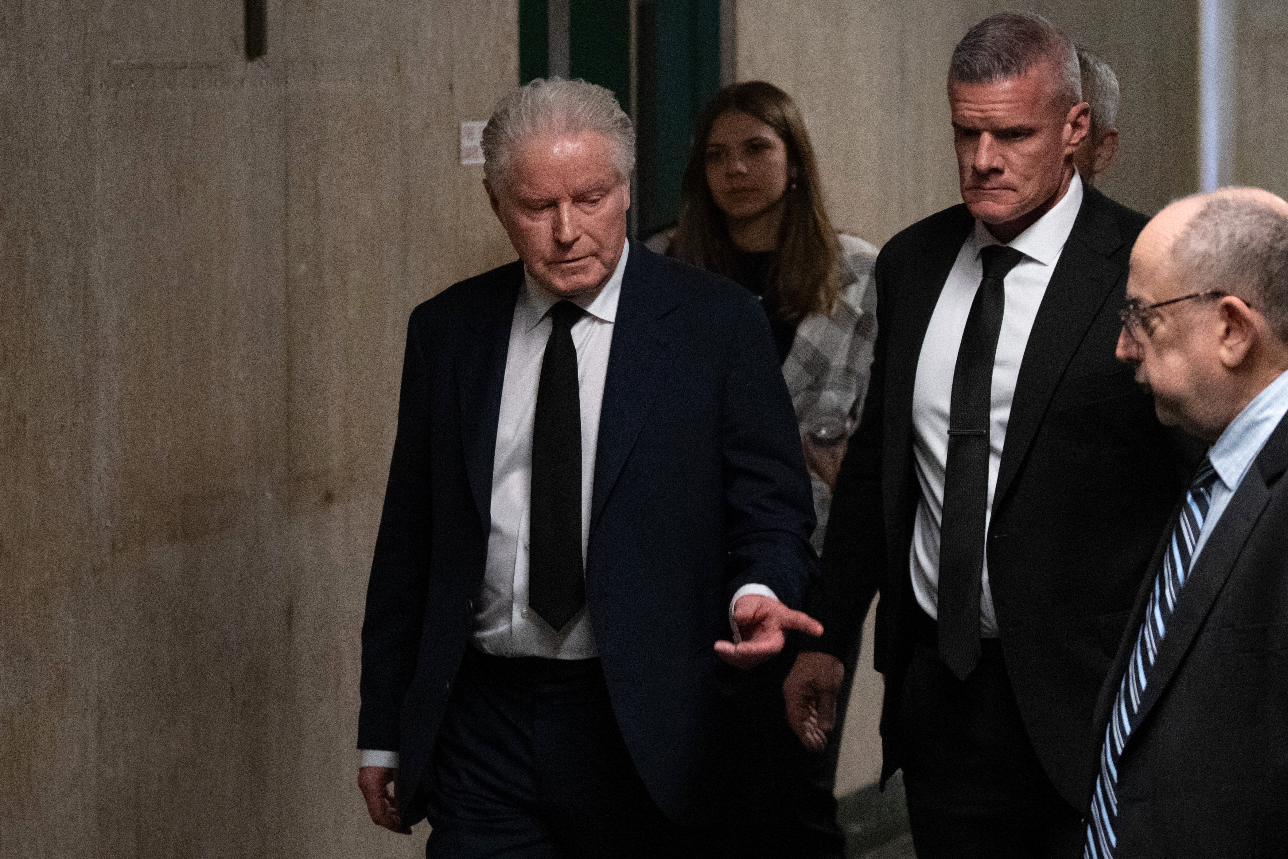 NEW YORK, NEW YORK - FEBRUARY 26: Don Henley of The Eagles (L) arrives back from the lunch break at Manhattan Criminal Court on February 26, 2024 in New York City. A judge will continue hearing testimony in a criminal case involving the ownership of the handwritten lyrics for songs on The Eagles' "Hotel California" album. 