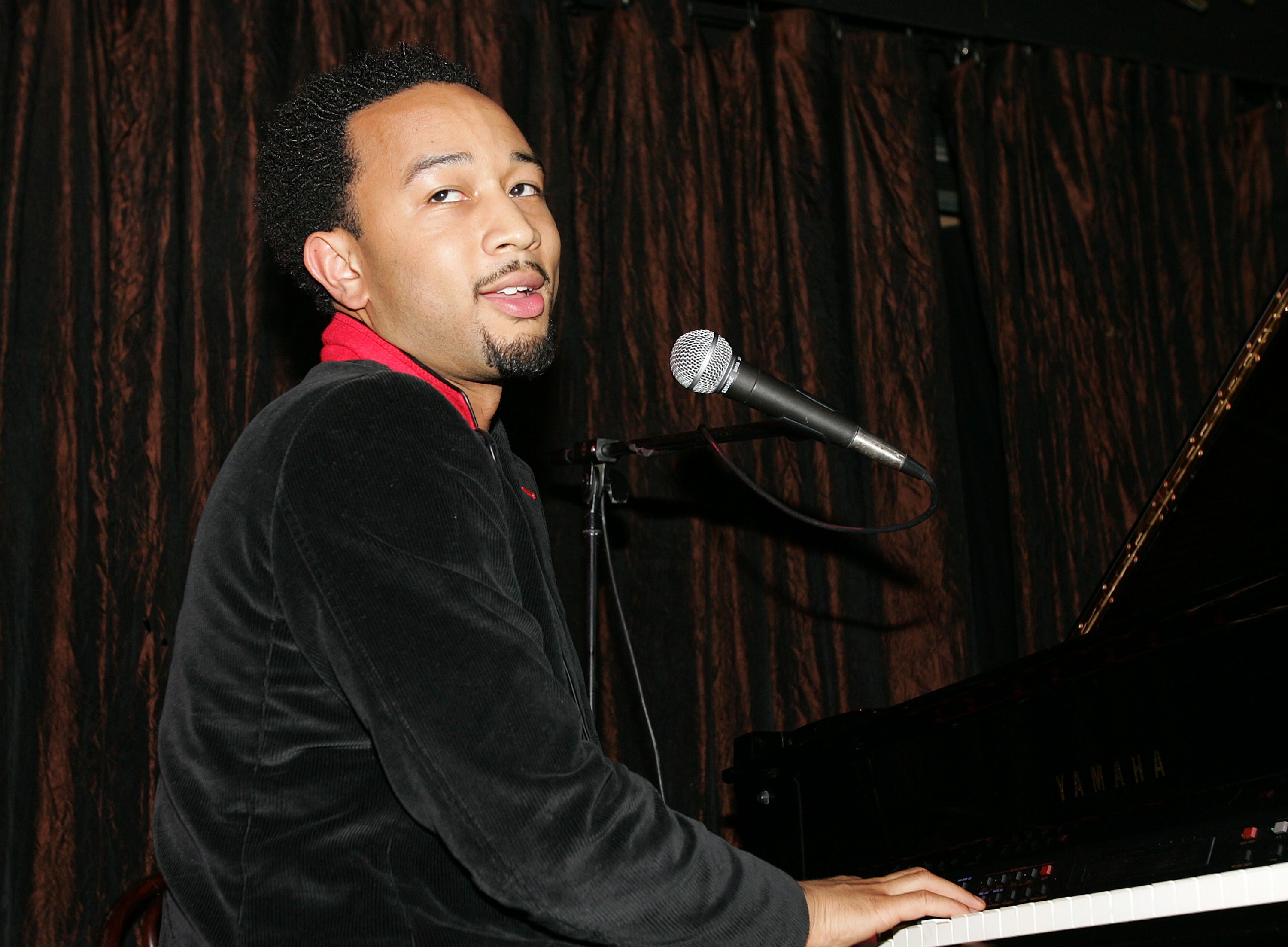 NEW YORK - NOVEMBER 8: R & B singer John Legend performs at the Kickoff Party for MTV "Spankin' New Music Week" November 8, 2004 in New York City. 