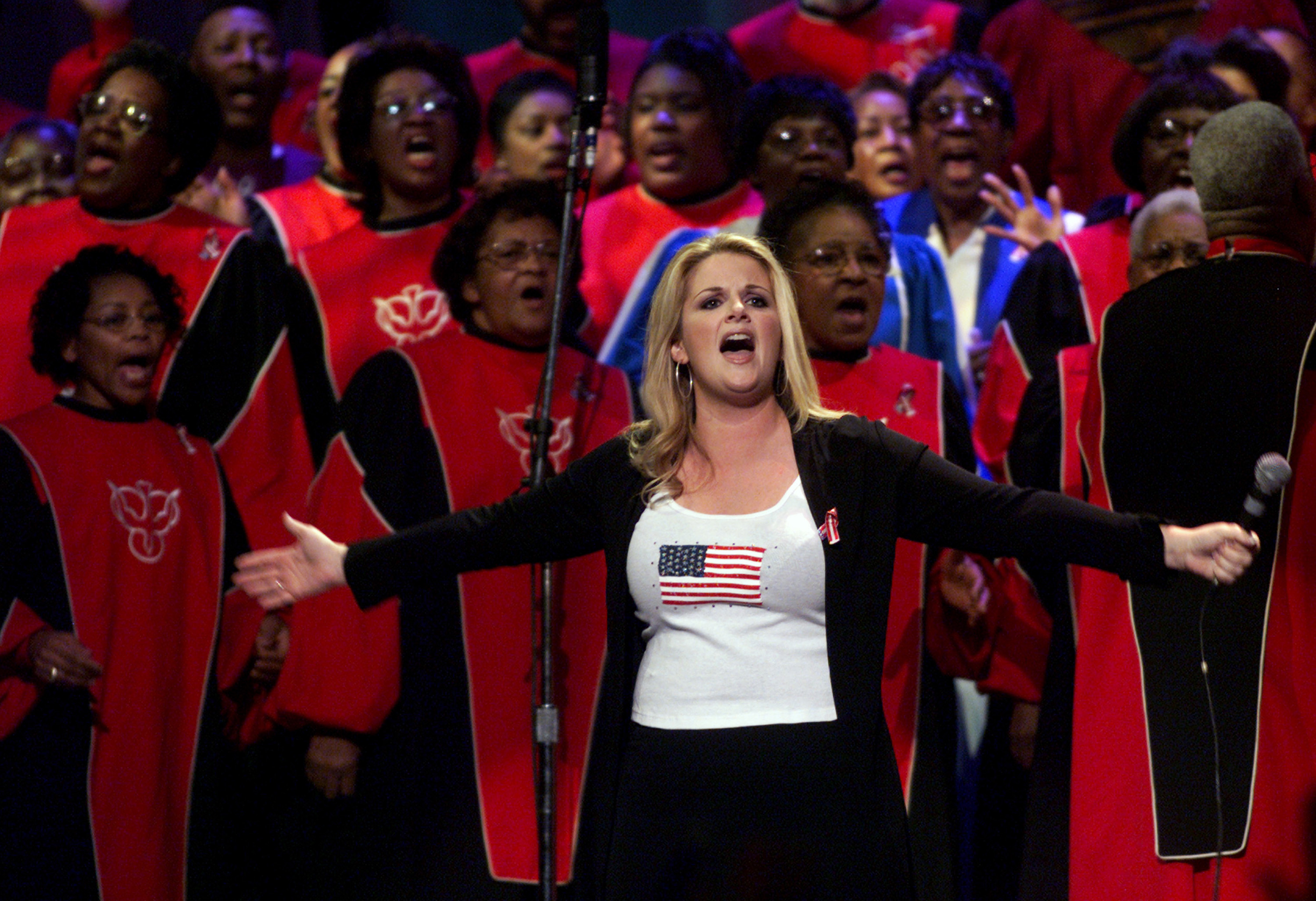 396207 24: Trisha Yearwood performs "We Shall Be Free" with a choir at the Country Freedom Concert October 21, 2001 at Nashville's Gaylord Entertainment Center. The concert will benefit the Salvation Army's Disaster Relief Fund and the victims, families and rescue workers affected by the events of September 11th. 