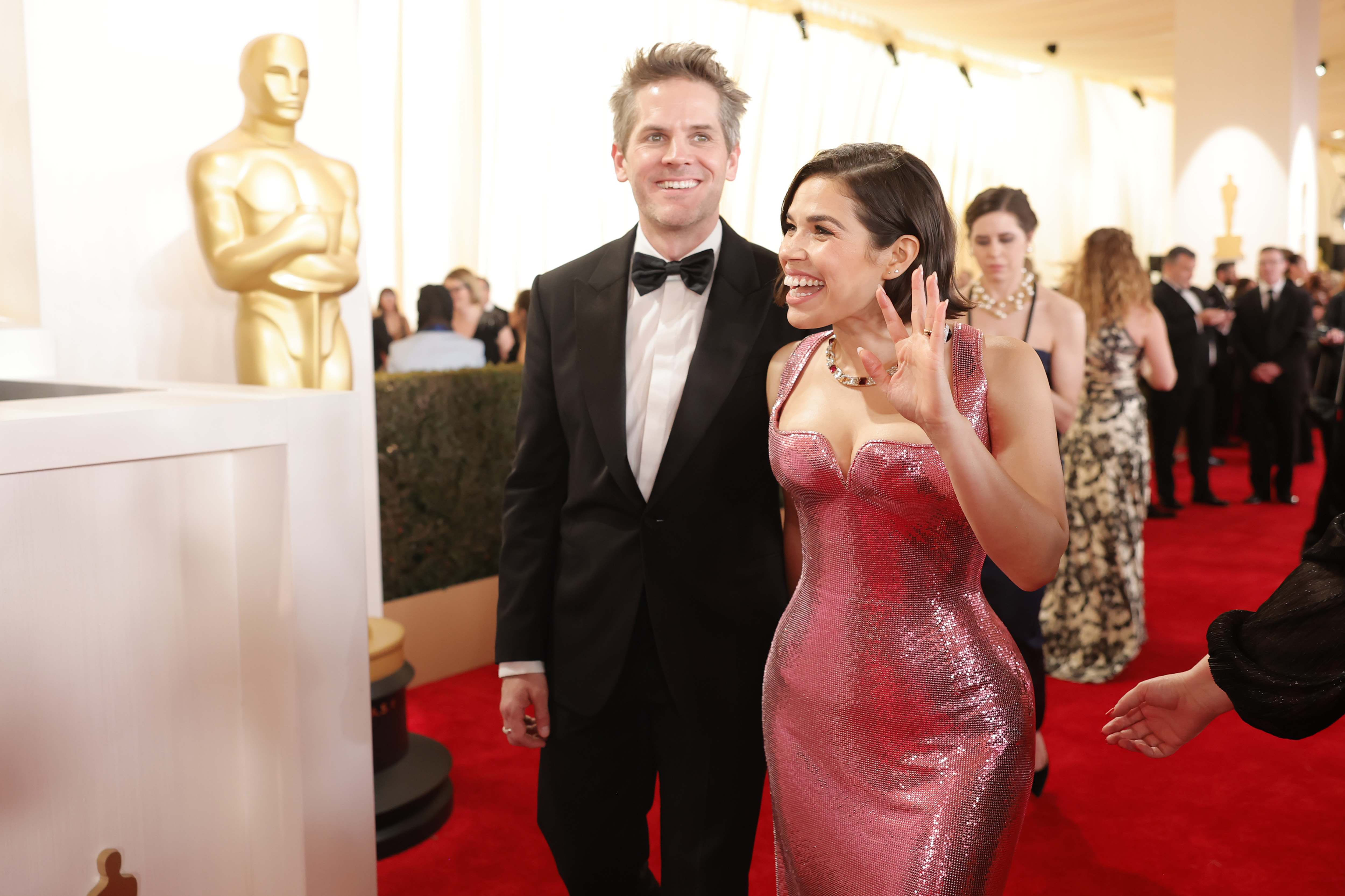 HOLLYWOOD, CALIFORNIA - MARCH 10: (L-R) Ryan Piers Williams and America Ferrera attend the 96th Annual Academy Awards on March 10, 2024 in Hollywood, California. 