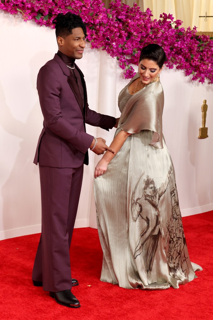 HOLLYWOOD, CALIFORNIA - MARCH 10: (L-R) Jon Batiste and Suleika Jaouad attend the 96th Annual Academy Awards on March 10, 2024 in Hollywood, California. 