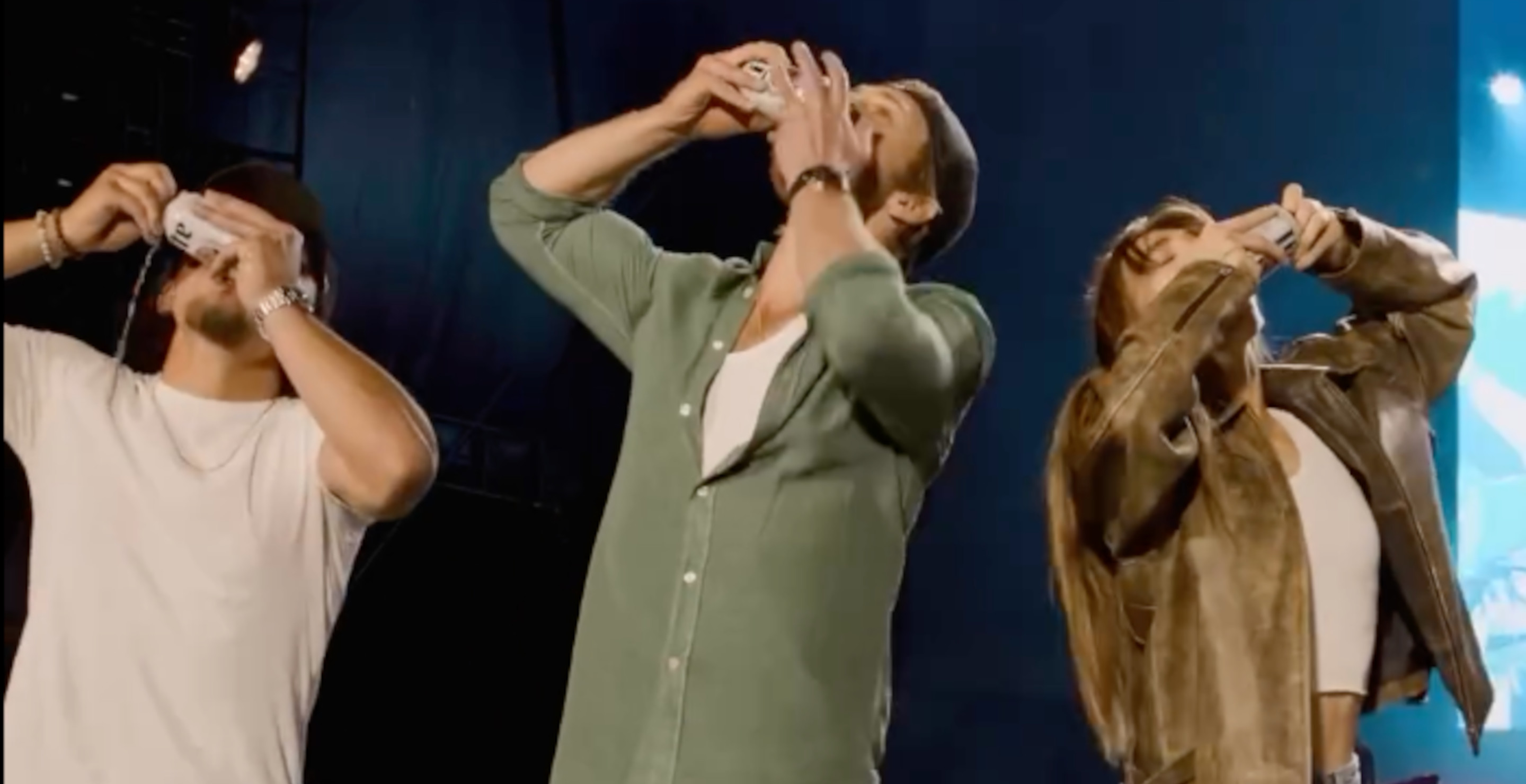 Glen Powell & 'Twisters' Cast Shotguns Beers With Luke Combs