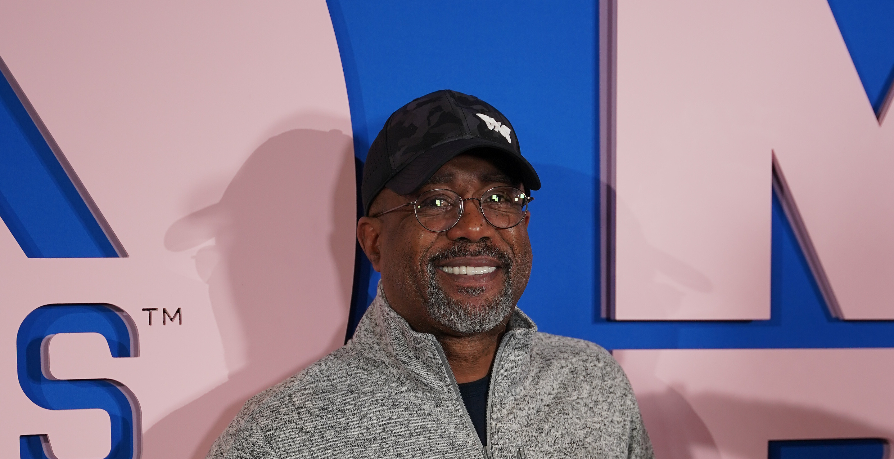 Woman Goes Viral For Asking Woody Harrelson To Take A Photo Of Her And Darius Rucker