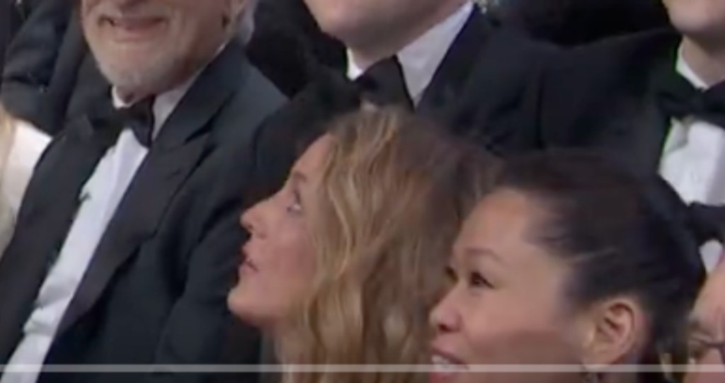 Blake Lively looking up at her husband with concern as he makes a joke about Justin Baldoni on SNL 50 Anniversary 