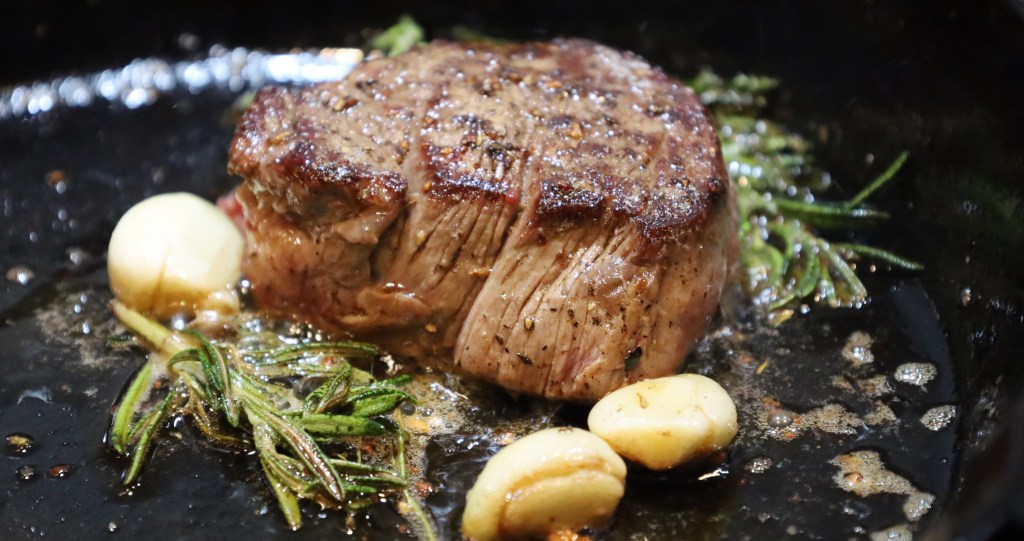 pan seared steak with garlic and rosemary