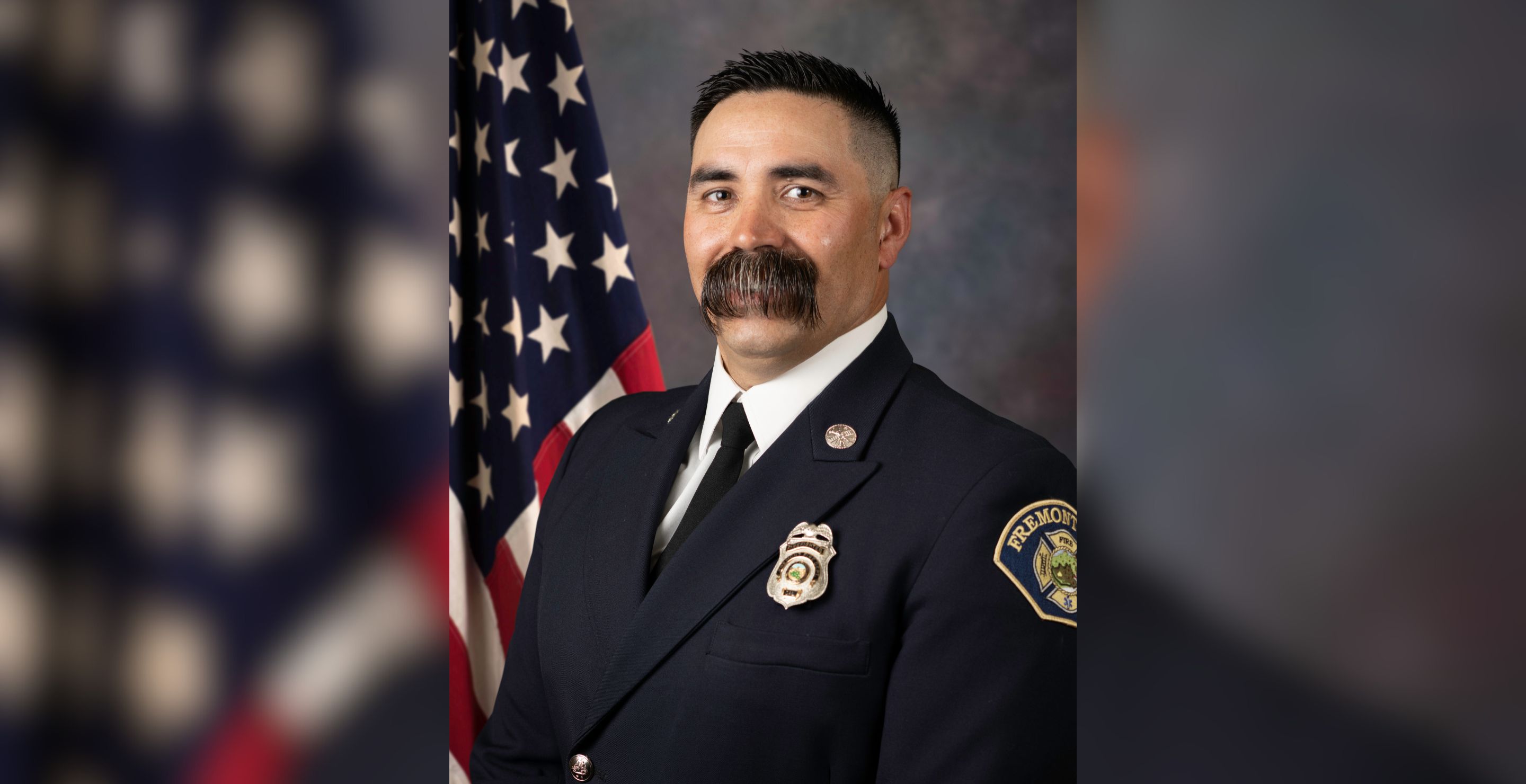 Firefighter Remembered For “Outrageously Large Mustache” Dies From “Cardiac Event”