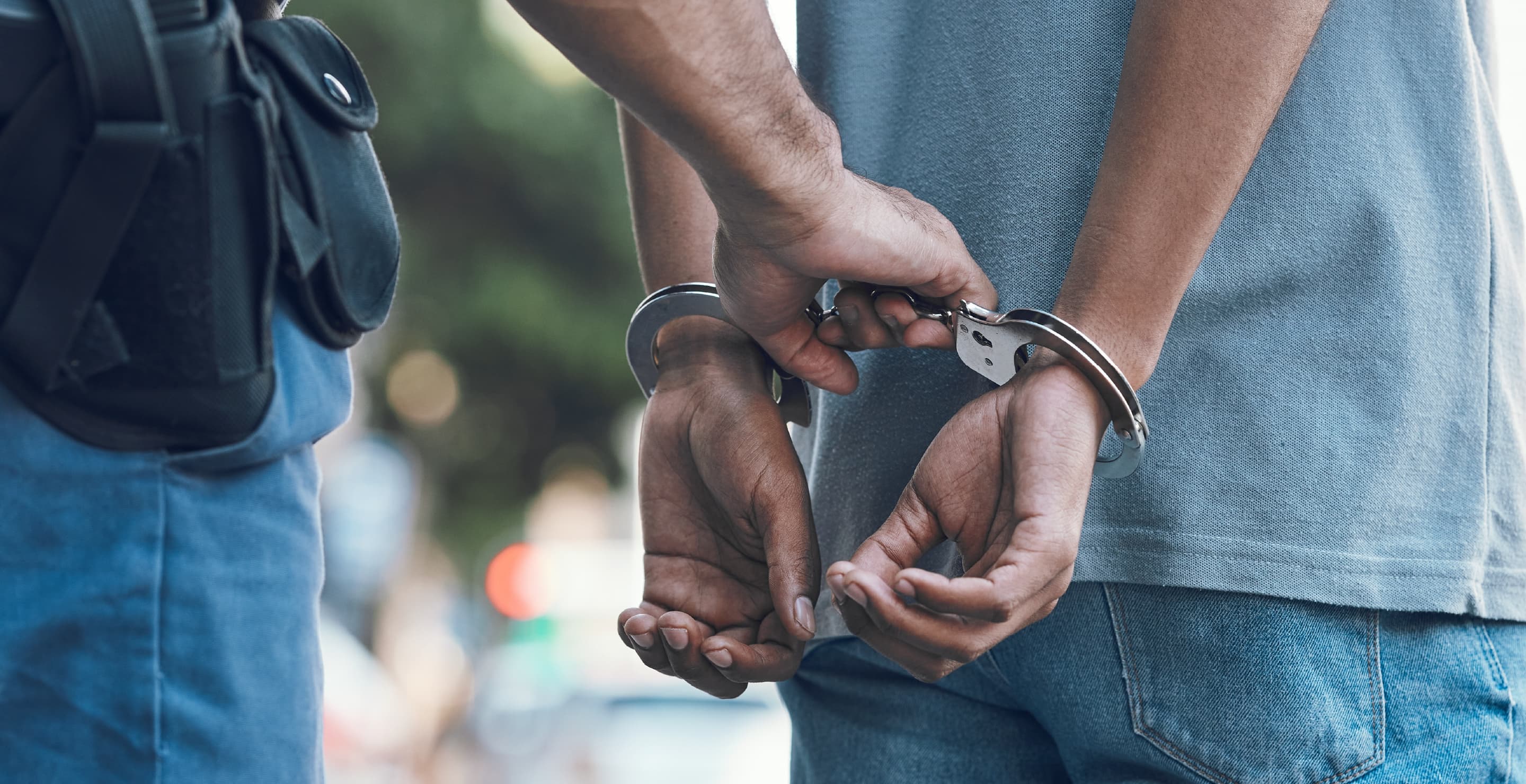 Arrested Man In Handcuffs