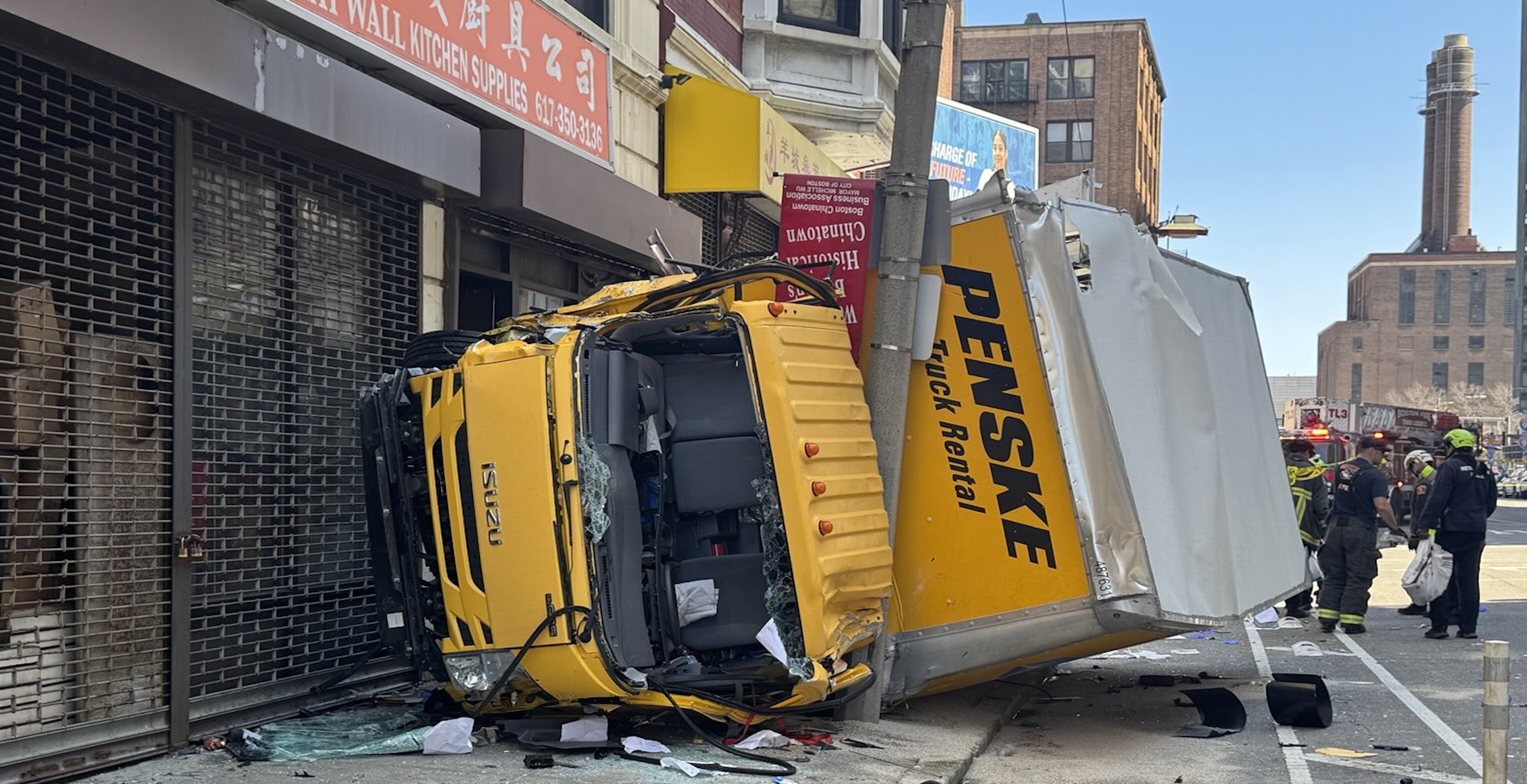 Moving Truck Crashes Onto Sidewalk And Flips Sidewalk Injuring Several People