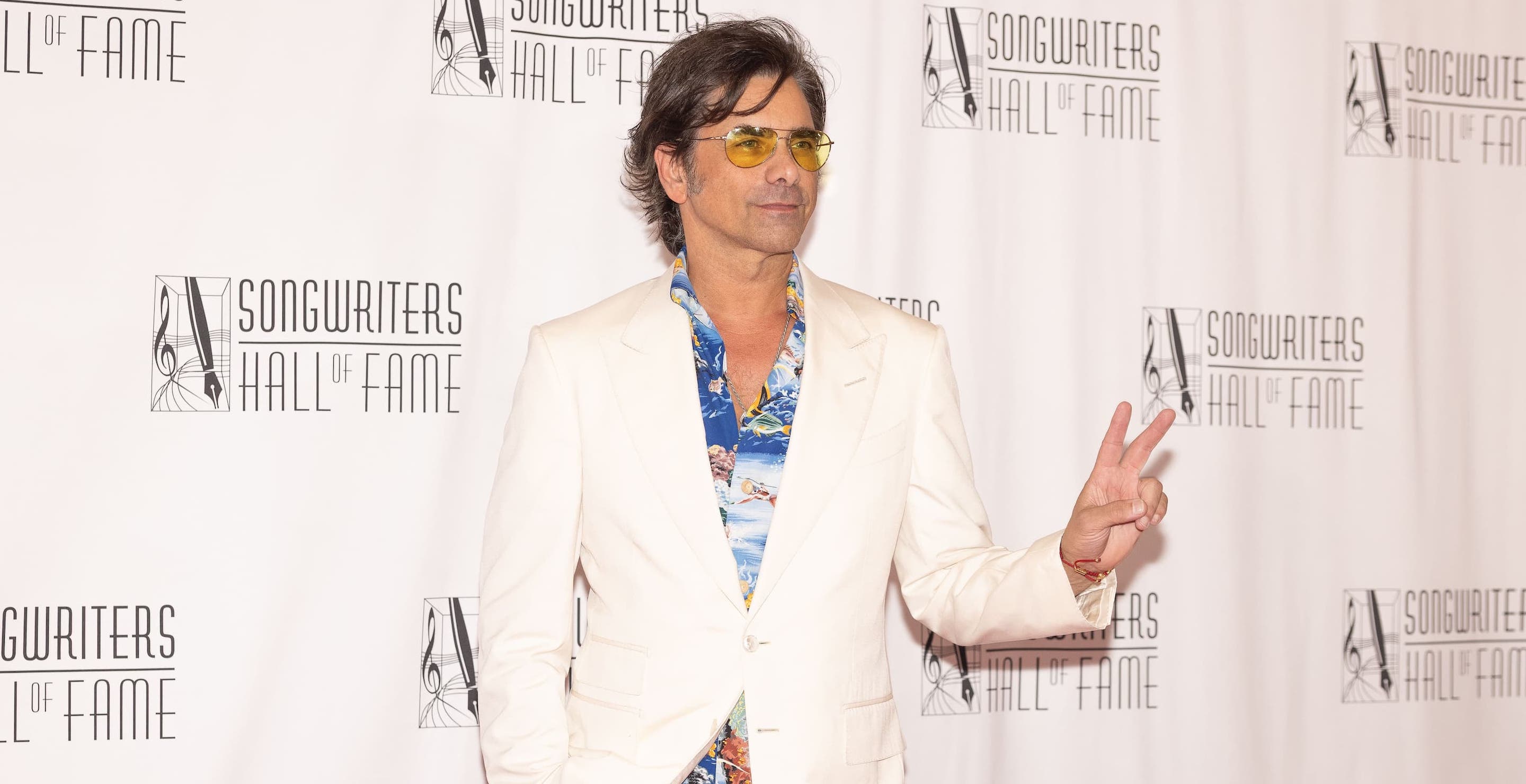 John Stamos Recalls Breaking Brian Wilson's Death to Fellow Beach Boys Member Mike Love