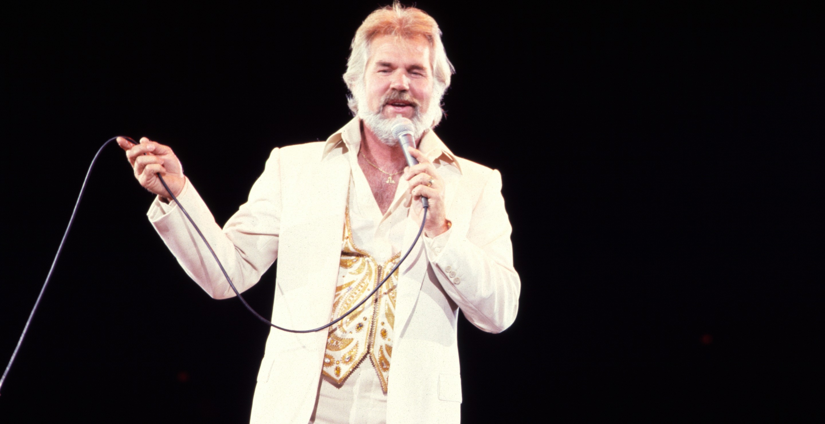 1. 4 Songs from the 70s That Every Country Wedding Playlist Needs