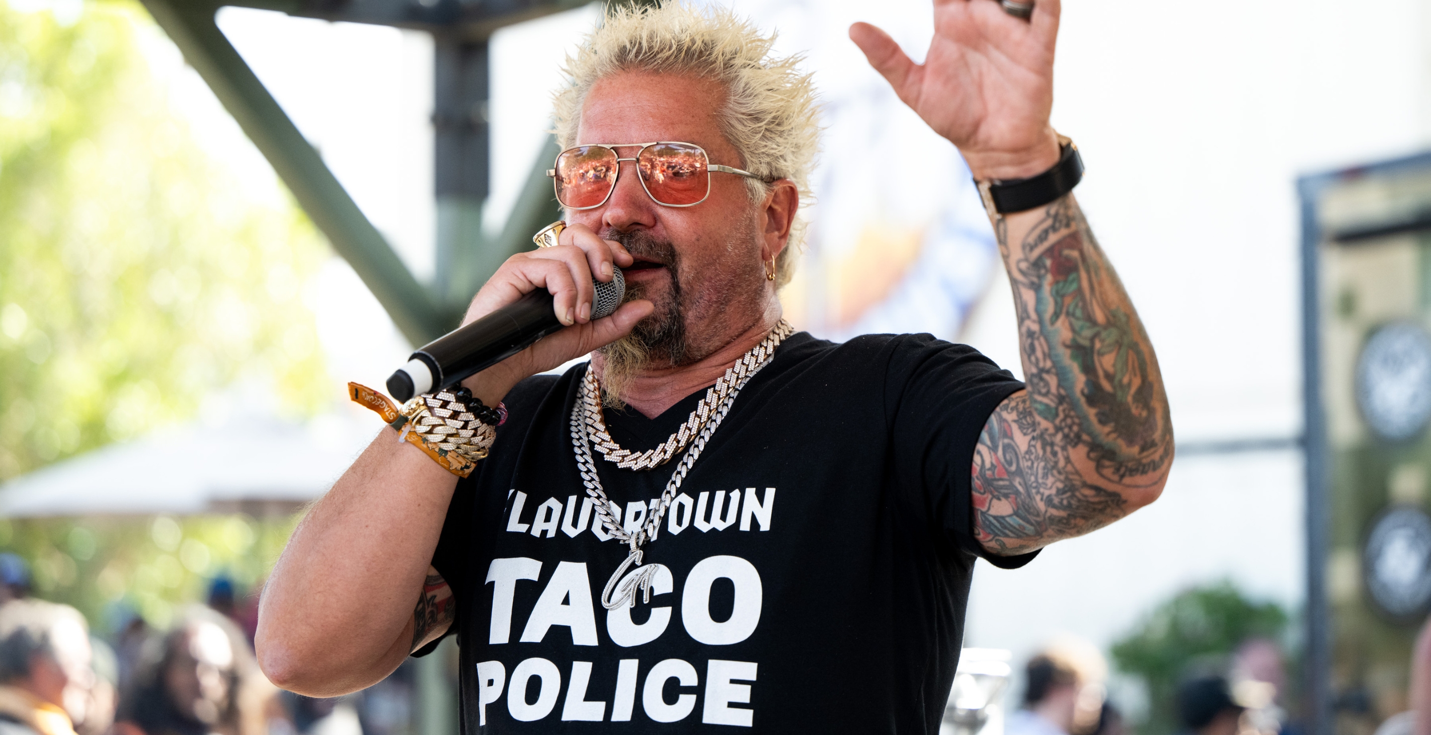 Guy Fieri Apparently Tried To Give This Country Icon the Boot at John Rich’s Restaurant