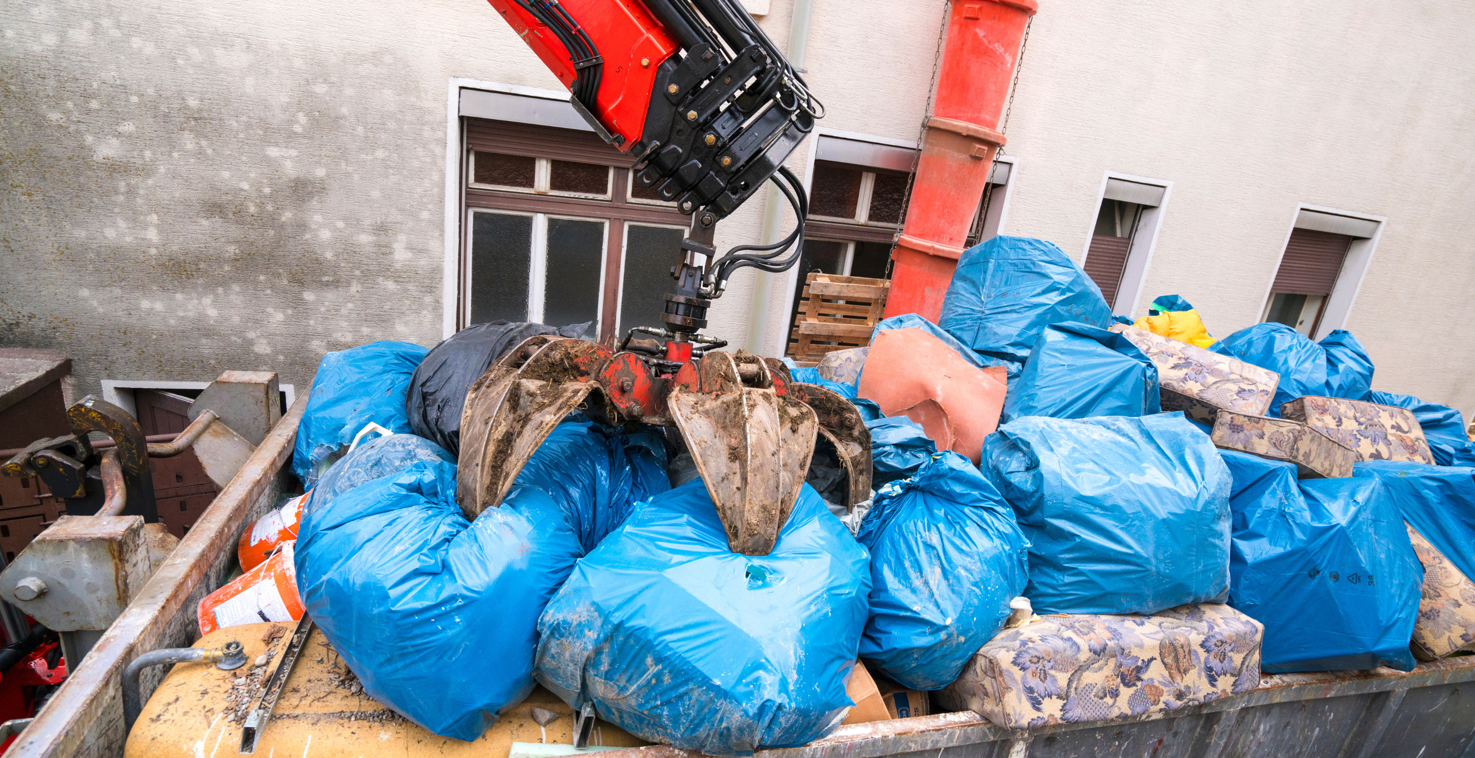 Woman Dies, Garbage Truck Claw