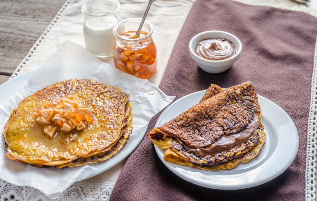Pumpkin crepes with fruit confiture and chocolate cream