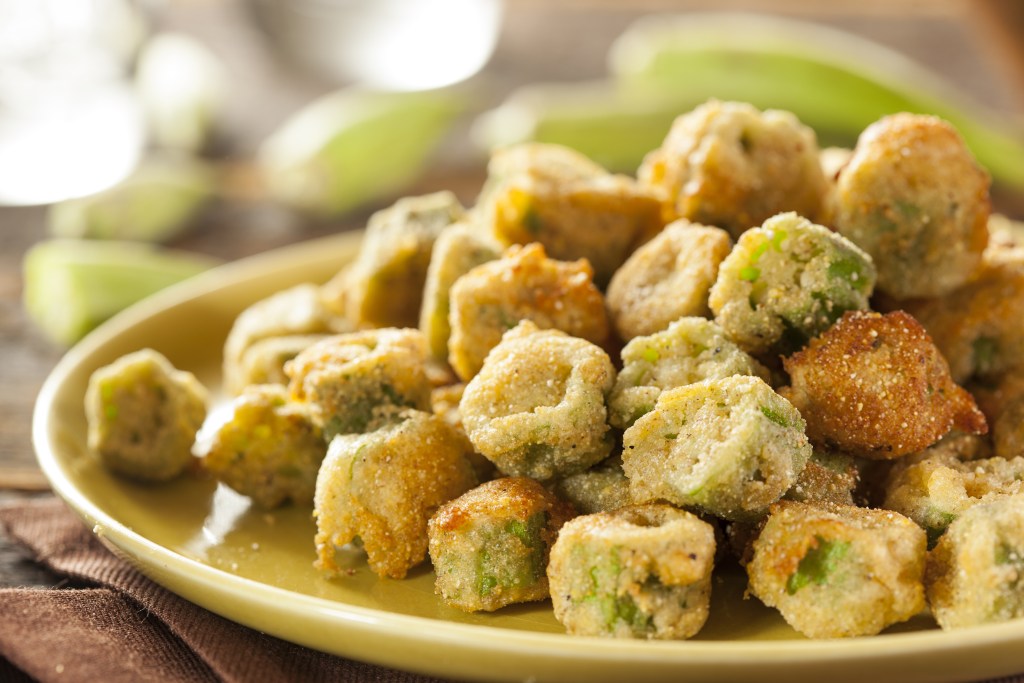 Organic Homemade Fried Green Okra against a Background