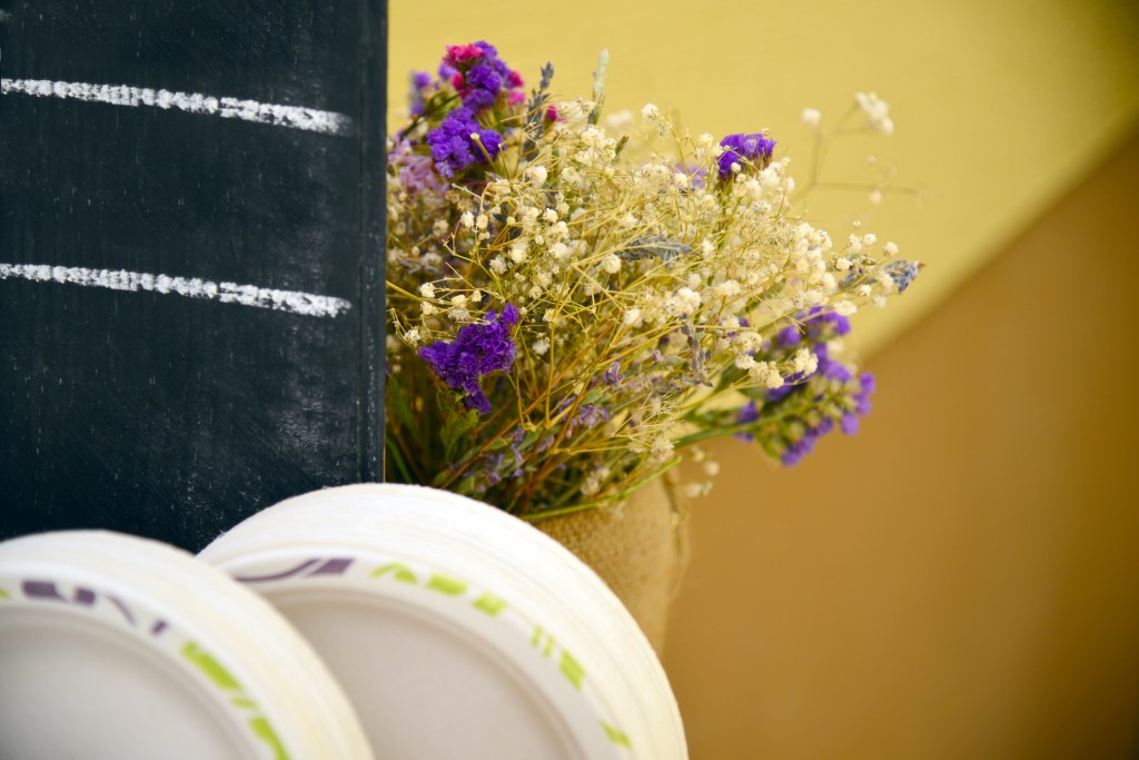 Outdoors kitchen stup and catering with black wall