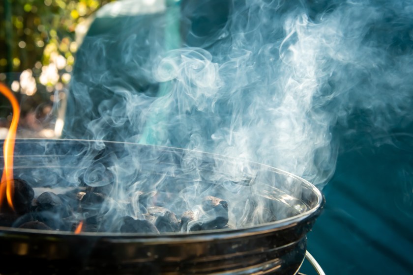 Charcoal barbecue on campground.