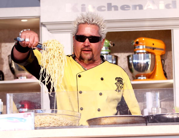 MIAMI BEACH, FL - FEBRUARY 28: Guy Fieri attends The 2010 South Beach Wine and Food Festival Grand Tasting Village on February 28, 2010 in Miami Beach, Florida. 