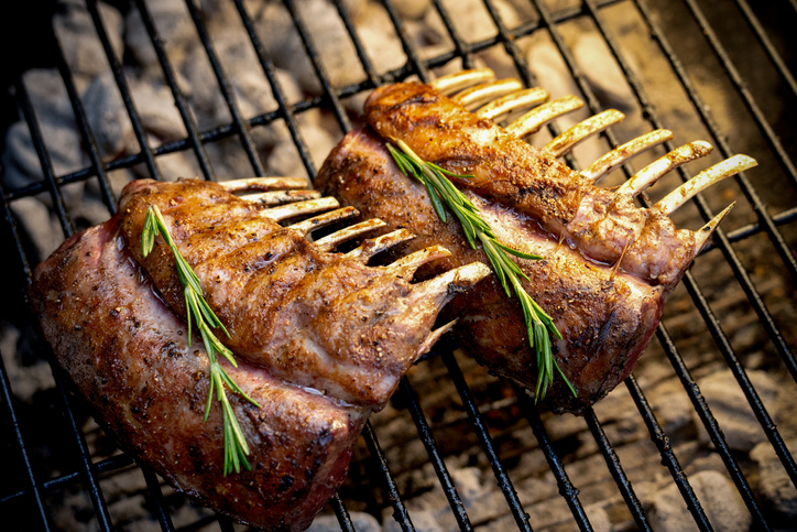 Lamb Chops seasoned with salt pepper old bay cooked to perfection with a sprig of rosemary