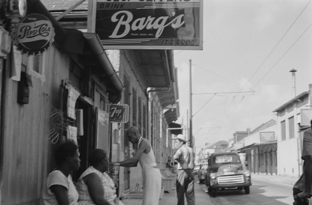 Advertisements for Barq's root beer, Pepsi-Cola and 7Up in the French Quarter or Vieux Carr&eacute; of New Orleans, Louisiana,  July 1961. 