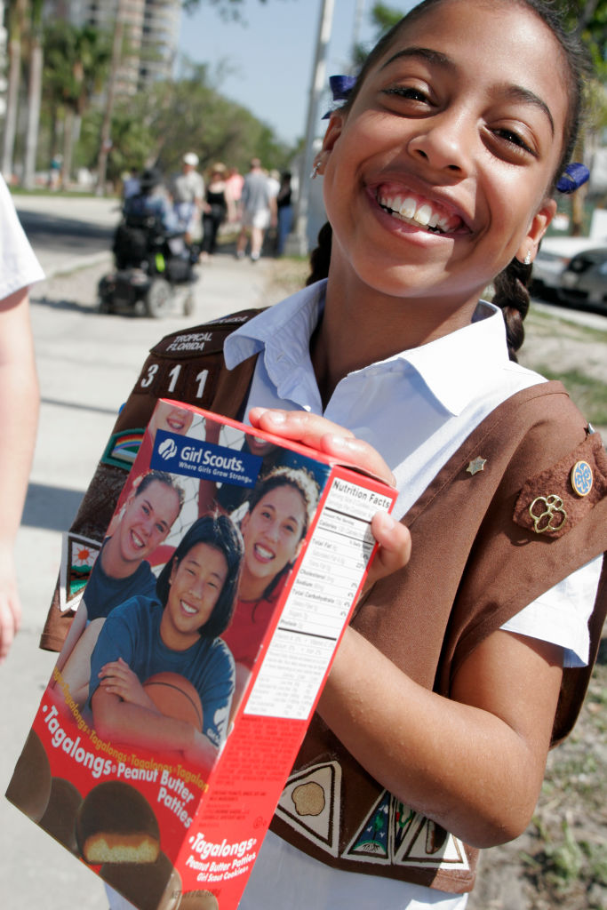 Miami, Coconut Grove Arts Festival, Girl Scout Selling Cookies. 