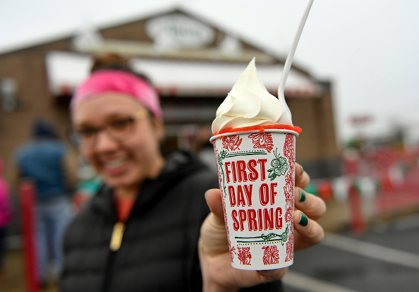 Kutztown University sophomore Nicolette Pagliei holds up her Rita's Italian Ice