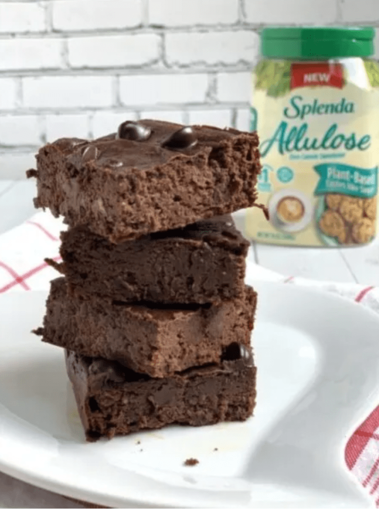 stack of brownies sitting on a plate