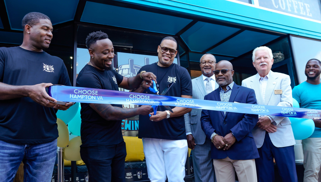 Brewers of 1865 Brewing Company Cutting a Ribbon