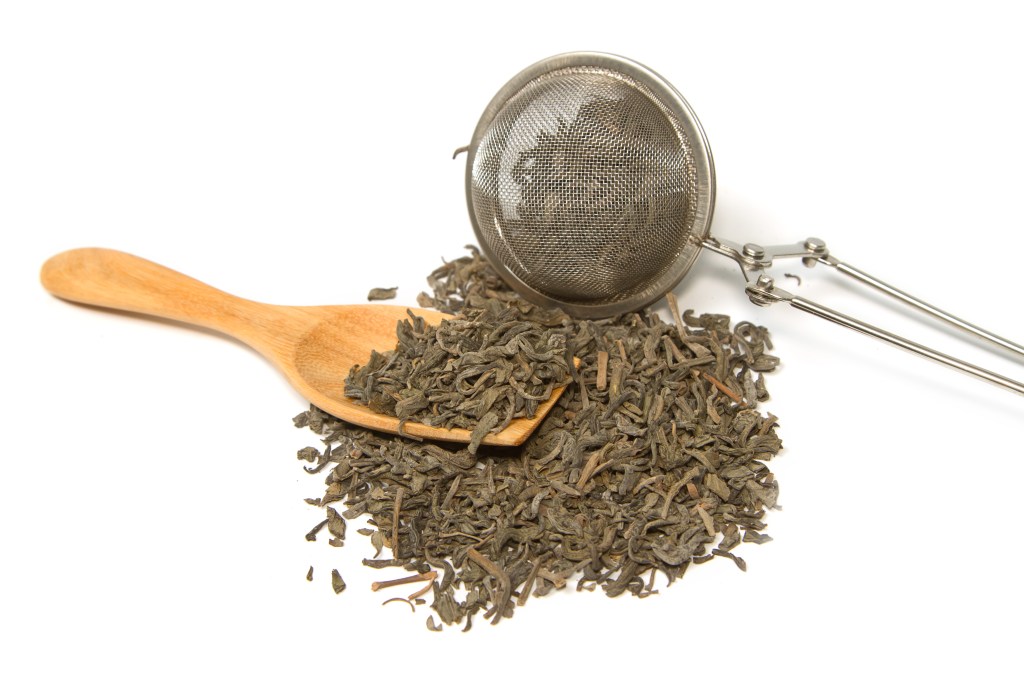 green tea and tea strainer