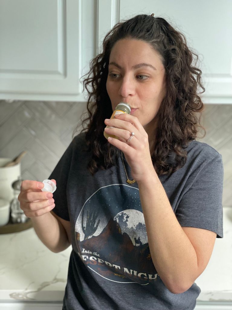 drinking ginger shot
