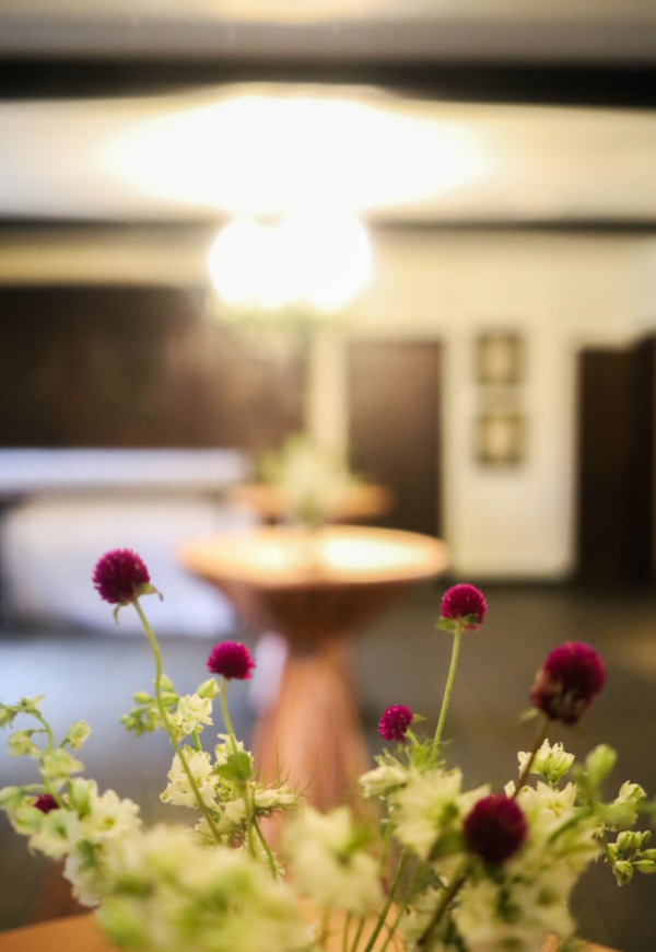 flowers with a table and light in the background