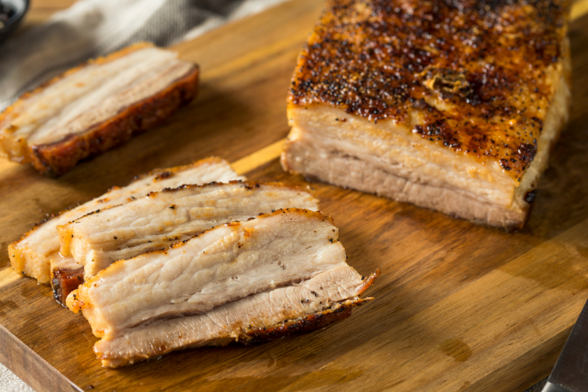 salt pork on wood board