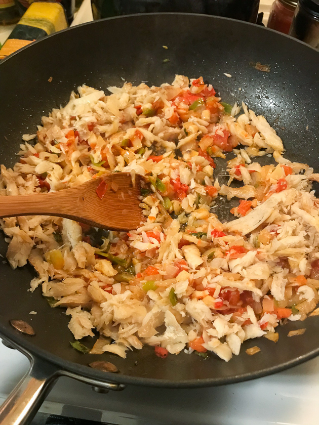 frying up saltfish fritters