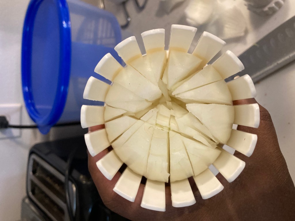 cutting onion for blooming onion