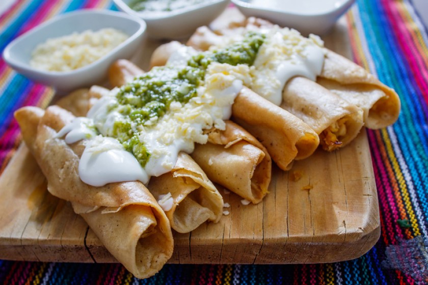 Mexican Fried chicken tacos with mexican crema and green salsa