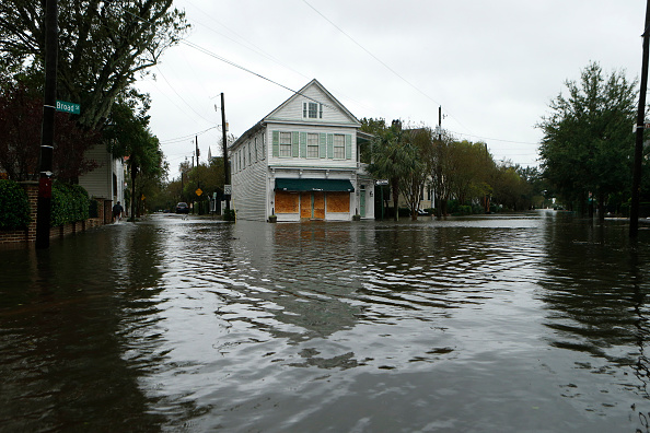 CHARLESTON, SC - OCTOBER 8: Water floods the streets on and around Broad Street in the wake of Hurricane Matthew on October 8, 2016 in Charleston, South Carolina. Across the Southeast, Over 1.4 million people have lost power due to Hurricane Matthew which has been downgraded to a category 1 hurricane on Saturday morning.