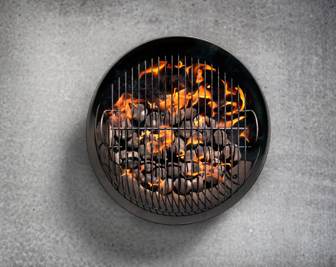 Charcoal BBQ on a Concrete Patio