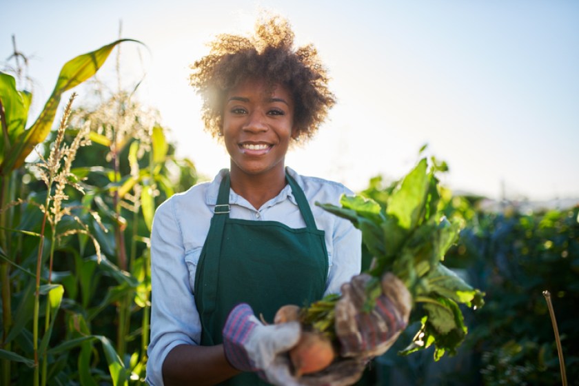 proud african american gardener posing for portrait