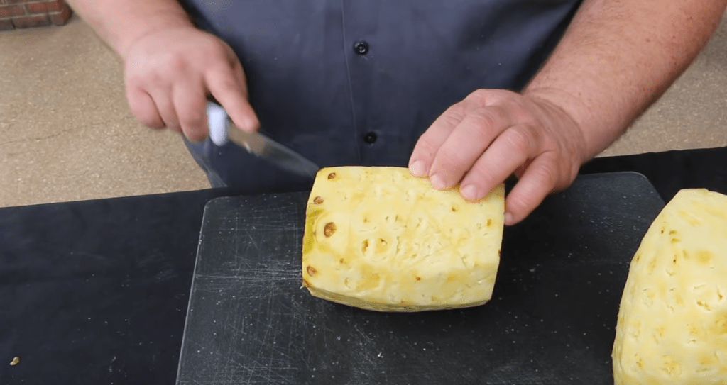cutting pineapple