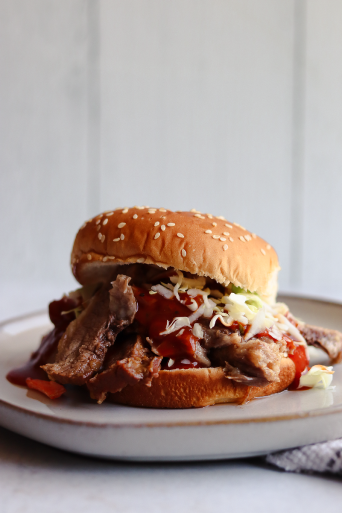 plate of instant pot bbq brisket sandwich