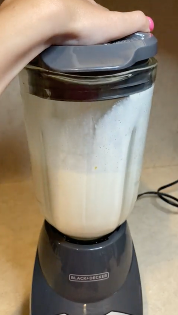 blending peach milkshake