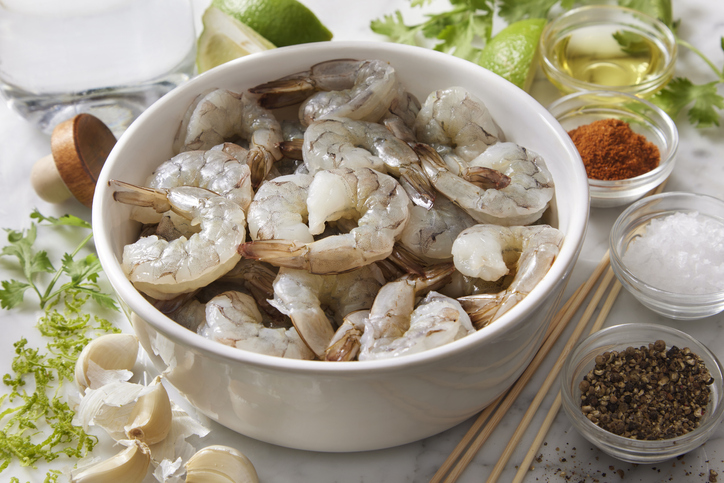Marinating Tequila Lime and Garlic Shrimp Skewers
